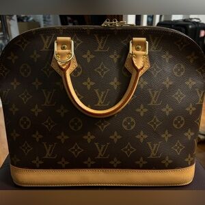 AUTHENTIC & PRISTINE LOUIS VUITTON’S ALMA PM IN MONOGRAM.